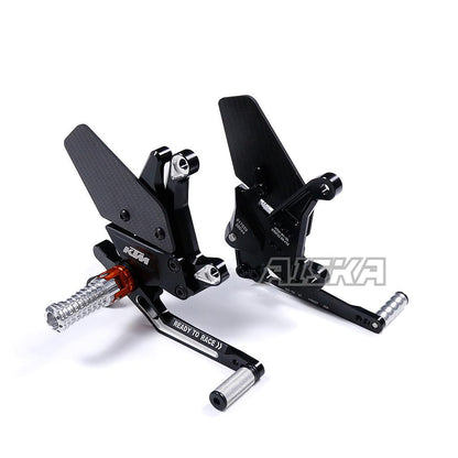 AISKA Carbon Fiber Wing Rearset Racing Parts Motorcycle CNC Adjustable Rearset for KTM 1290 1390 Super Duke 2020-2025